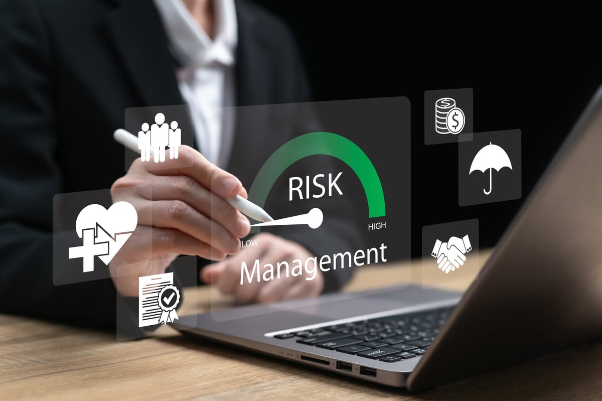 A professional evaluating risk decisions and quality monitoring to reduce financial and operational exposure
